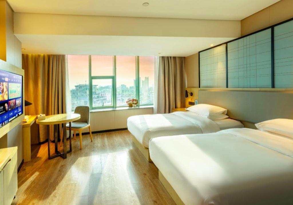 Echarm Hotel Yangjiang Baili Plaza Zewnętrze zdjęcie