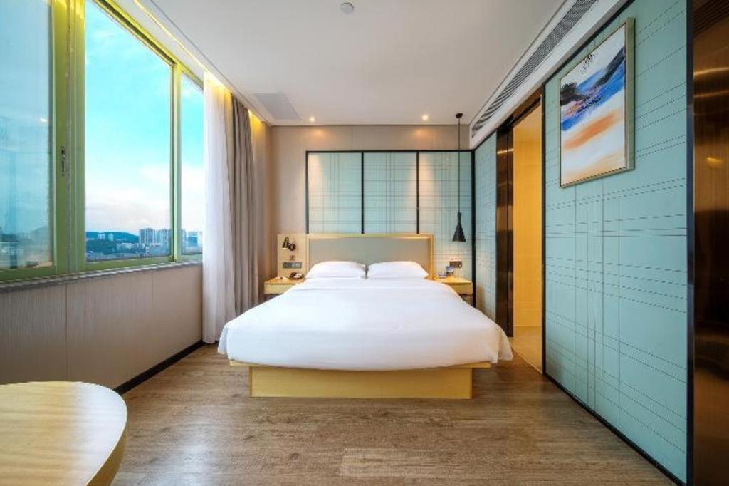Echarm Hotel Yangjiang Baili Plaza Zewnętrze zdjęcie