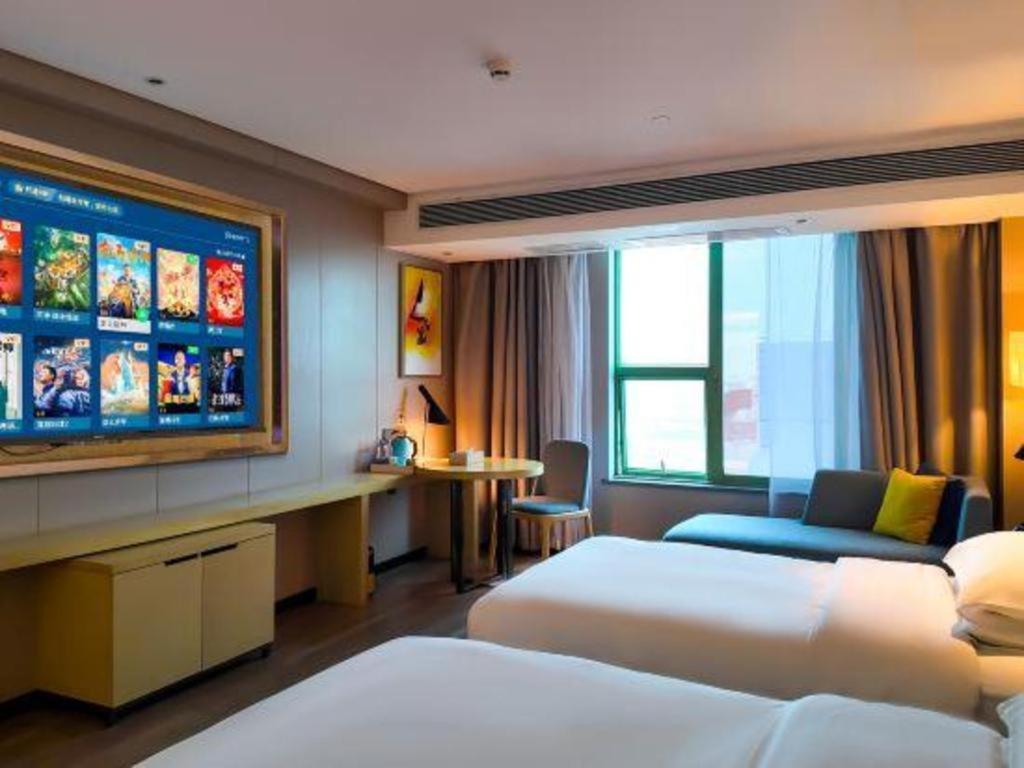 Echarm Hotel Yangjiang Baili Plaza Zewnętrze zdjęcie