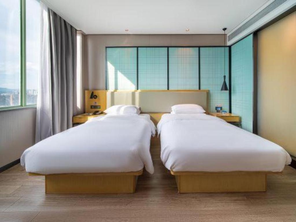 Echarm Hotel Yangjiang Baili Plaza Zewnętrze zdjęcie