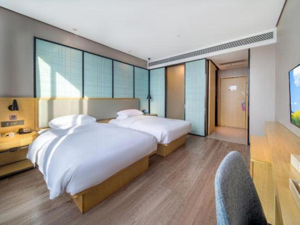 Echarm Hotel Yangjiang Baili Plaza Zewnętrze zdjęcie
