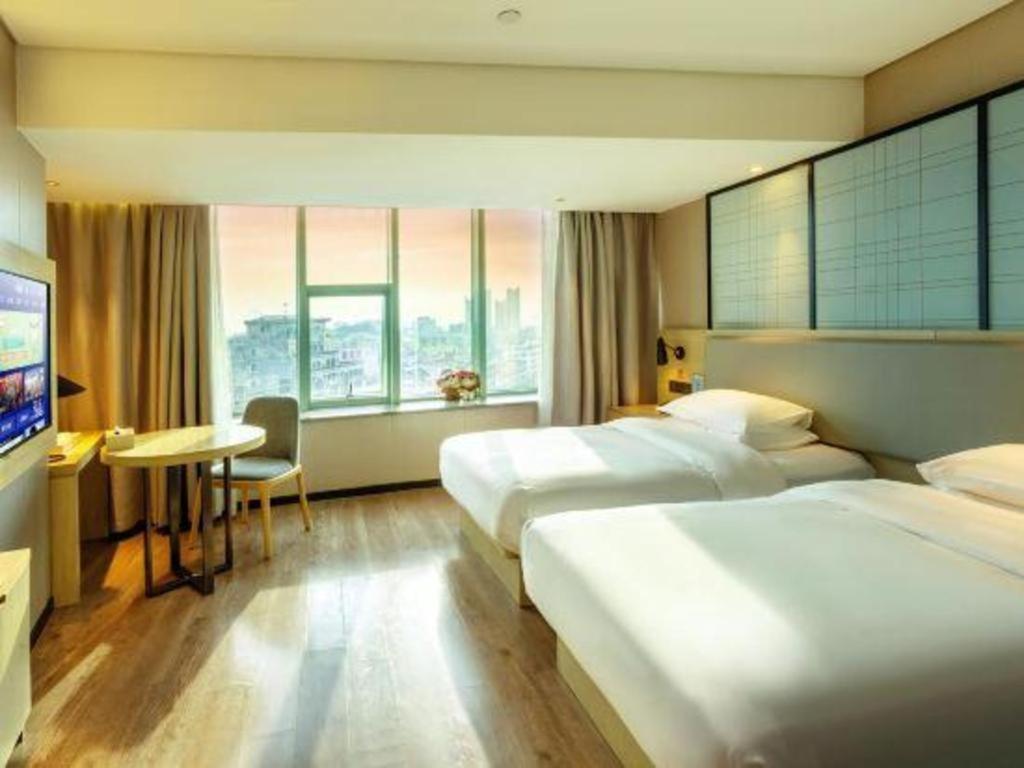 Echarm Hotel Yangjiang Baili Plaza Zewnętrze zdjęcie
